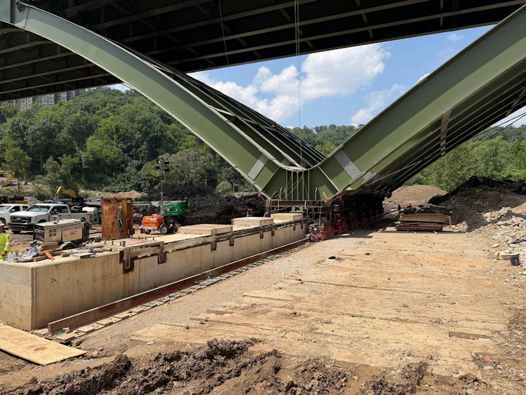 The new Commercial Street Bridge being slid into place.