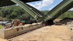 The new Commercial Street Bridge being slid into place.