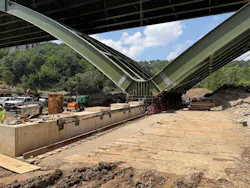The new Commercial Street Bridge being slid into place.