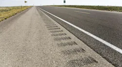 A rumble strip on a road shoulder.
