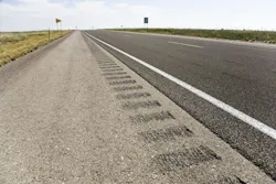 A rumble strip on a road shoulder.