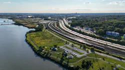 Aerial view of Interstate 495 and the Northeast Corridor railroad along the Delaware River near Wilmington, Delaware.