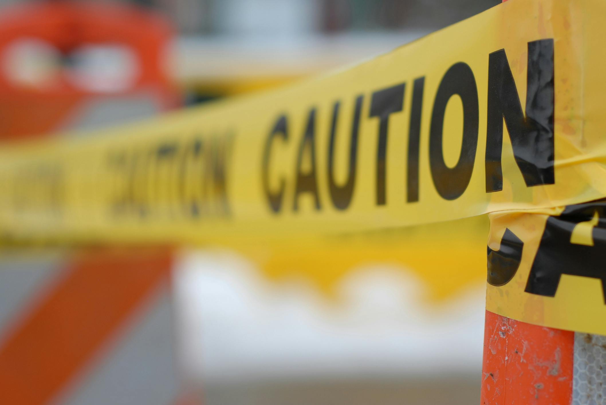 A caution line in front of a work zone.
