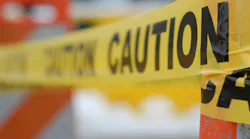 A caution line in front of a work zone.