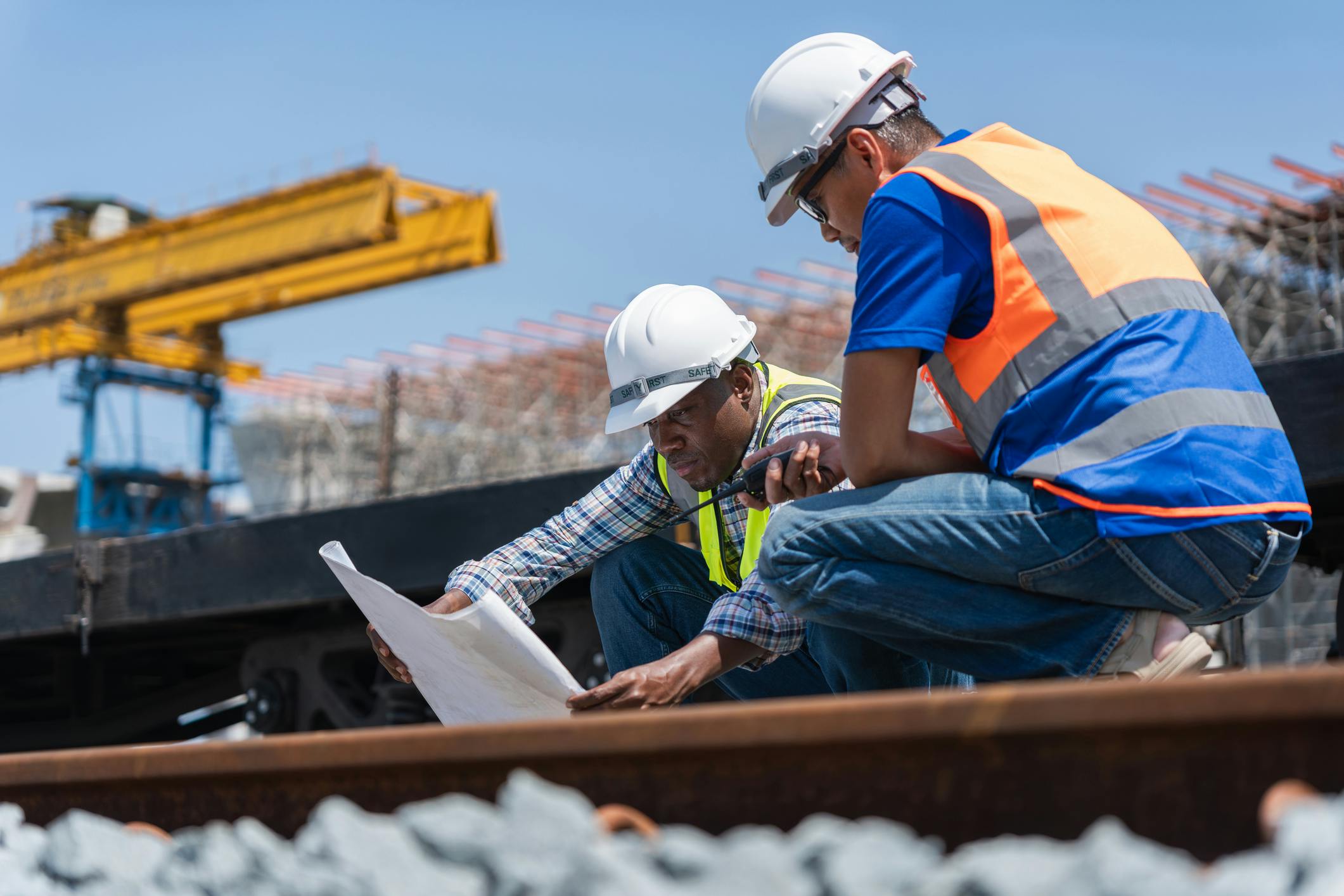 Engineers reviewing construction plans.