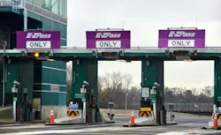 E-Z pass tolls and cameras along a toll road,