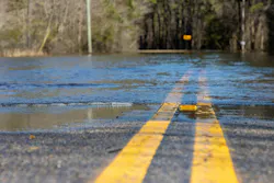 Flooding on a paved road.