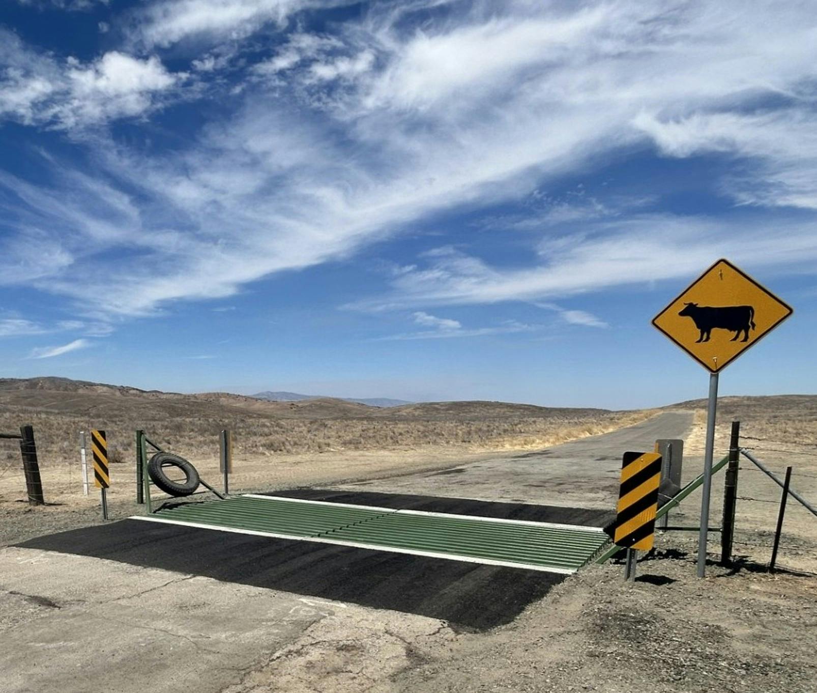 A cattle guard in a rural area of California.